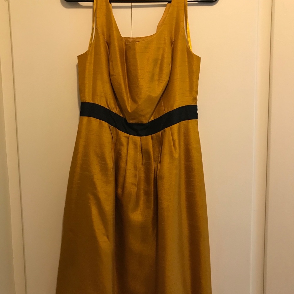 Gold knee length dress